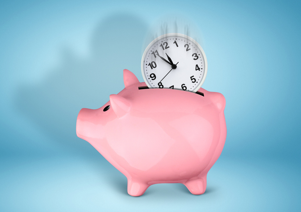 Saveing time concept, piggy bank with clock